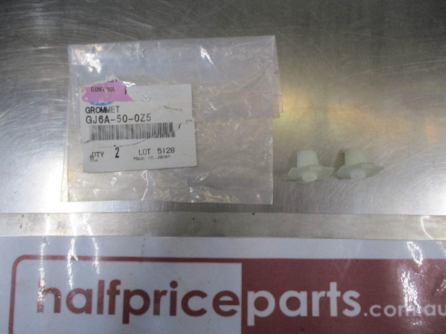 Mazda 3/5/6/CX-7/MPV Genuine Bumper Cover Grommet 2 Pack New Part