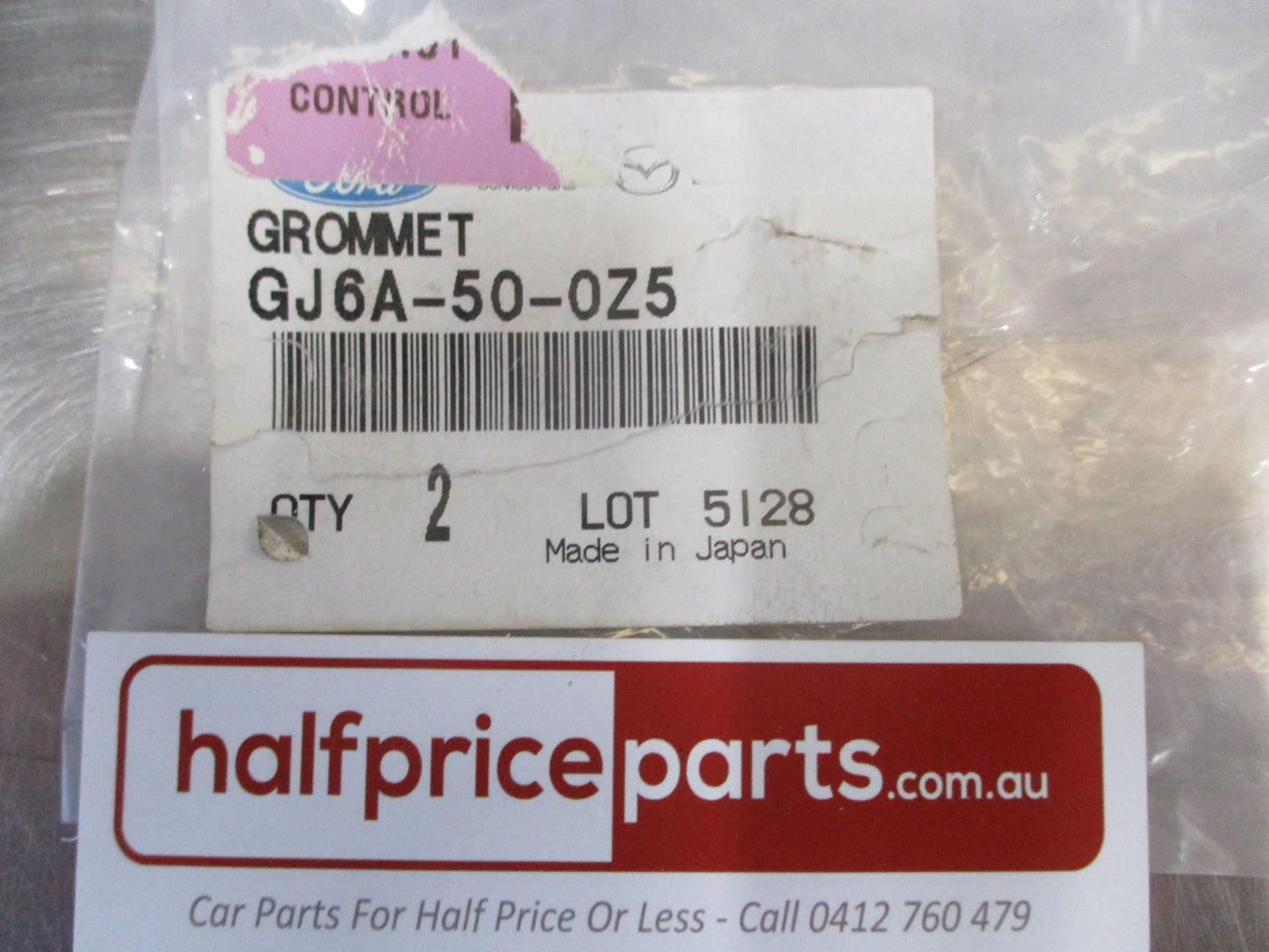 Mazda 3/5/6/CX-7/MPV Genuine Bumper Cover Grommet 2 Pack New Part
