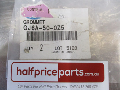 Mazda 3/5/6/CX-7/MPV Genuine Bumper Cover Grommet 2 Pack New Part