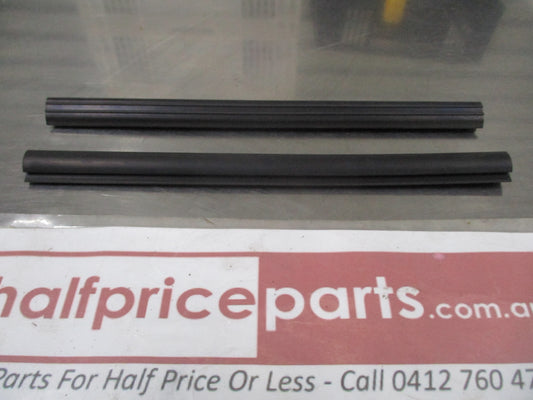 Mazda 2 Genuine Rain Rail Protectors New Part