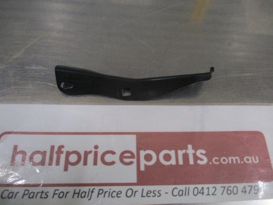 Mazda BG 323 Genuine Front Bumper Lower Left Hand Bracket New Part