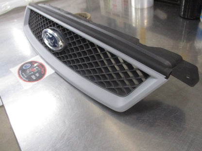 Ford Focus LS/LT Genuine Front Grille (In Factory Primer) New Part