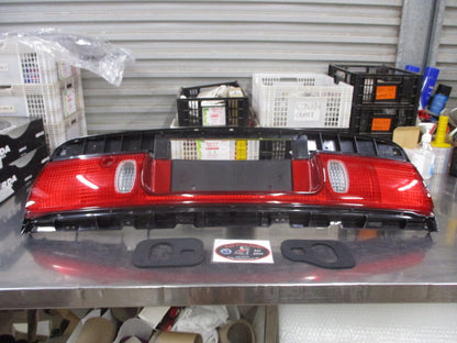 Ford Telstar AX Hatch Back Genuine Rear Garnish Light Assembly New Part