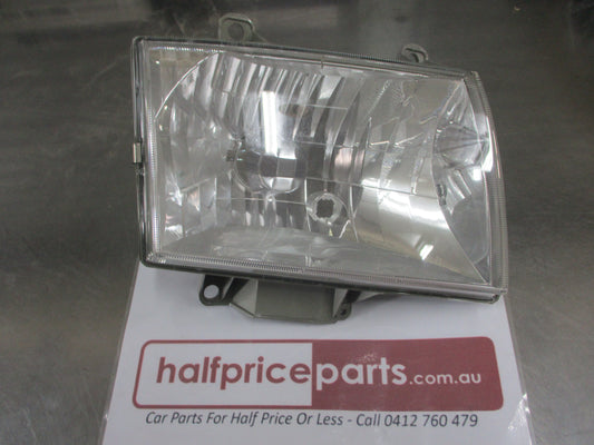 Mazda B2200-B2500-B2600 Genuine Right Hand Headlight Used VGC.