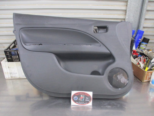 Mitsubishi Mirage Genuine Left Hand Front Door Trim (Passenger) New Part