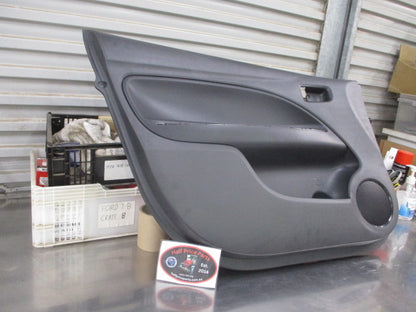 Mitsubishi Mirage Genuine Left Hand Front Door Trim (Passenger) New Part