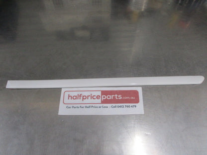 Ford Laser KQ Genuine Left Hand Rear Door Side Body Moulding (Factory WHITE) New Part