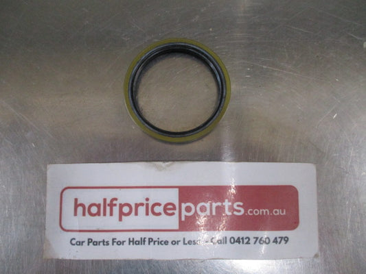Ford Festiva Genuine Front Wheel Bearing Seal - New Part