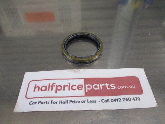 Ford Festiva Genuine Front Wheel Bearing Seal - New Part
