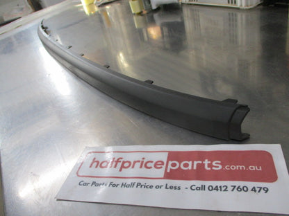 Ford Focus LS/LT Genuine Rear Bar Center Moulding (Black) New Part