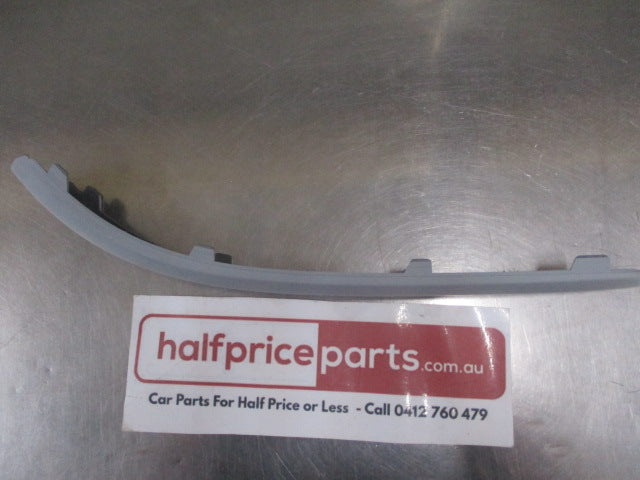 Ford Focus LS/LT Genuine Right Hand Rear Bumper Moulding (Unpainted) New Part