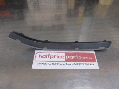 Ford Focus LS/LT Genuine Right Hand Rear Bumper Moulding (Unpainted) New Part