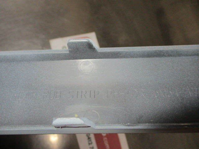 Ford Focus LS/LT Genuine Right Hand Rear Bumper Moulding (Unpainted) New Part