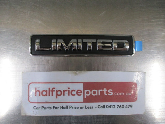 Ford Escape-Mazda Tribute Genuine Rear Tail Gate Emblem (LIMTITED) - New Part