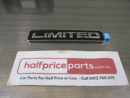 Ford Escape-Mazda Tribute Genuine Rear Tail Gate Emblem (LIMTITED) - New Part