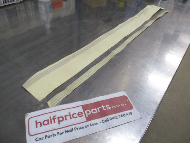 Ford KH Laser Genuine Lefthand (Passenger) INDY Door Strip - New Part