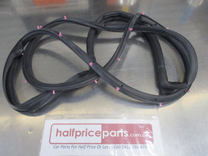Mazda 121 Genuine Right Hand Rear Door Weatherstrip Rubber New Part