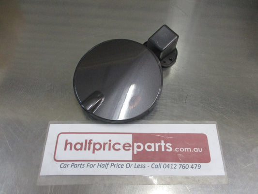 Holden Captiva Genuine Fuel Door & Assy (Factory Grey)) New Part