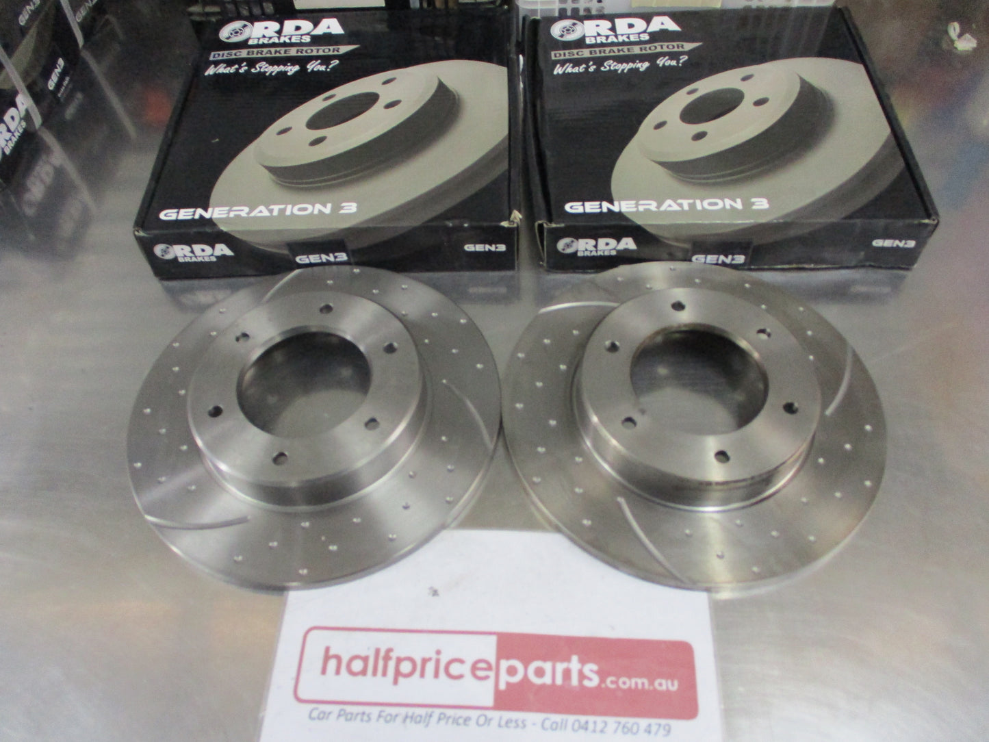 RDA Front Disc Brake Rotors (Pair) Slotted-Dimpled Suits Toyota Hilux New Part