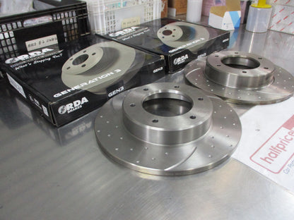 RDA Front Disc Brake Rotors (Pair) Slotted-Dimpled Suits Toyota Hilux New Part