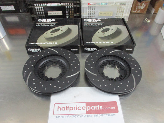 RDA Front Disc Brake Rotors (Pair) Slotted-Dimpled Suits Mitsubishi Triton MK 2WD-4WD New Part