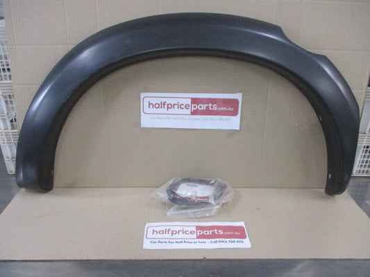 Ford Courier PD Dual Cab Genuine Left Hand Rear Flare With Seal New Part