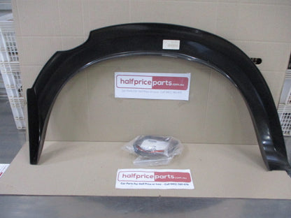 Ford Courier PD Dual Cab Genuine Left Hand Rear Flare With Seal New Part