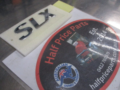 Hyundai Santa Fe Genuine Chrome Emblem (SLX) New Part