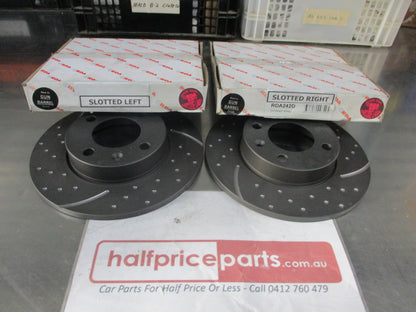 RDA Front Disc Brake Rotors (Pair) Slotted-Dimpled Suits VW Golf/Passet New Part