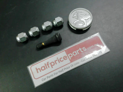 Holden YG Cruze Genuine Alloy Centre Cap/Valve And Wheel Nuts New Part