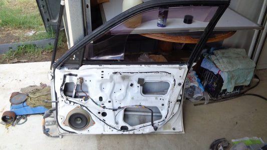 USED Right (Driver) front door shell to suitable for Toyota Corolla Sedan VGC