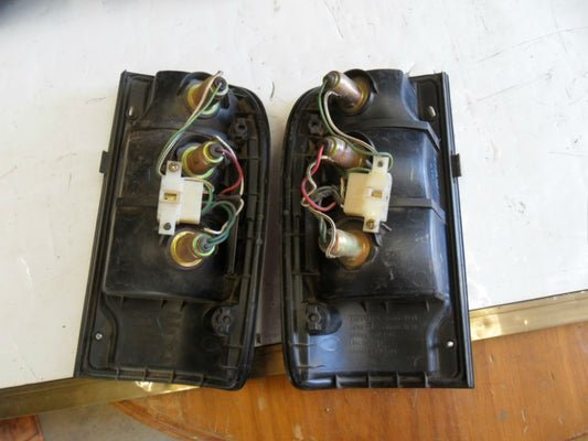 Rear Tail Lights suits Toyota Hilux 1997 - 2005 Tub Used Part