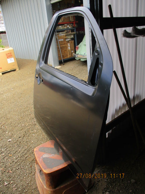 Nissan Navara D40T Single cab Genuine Front Left Hand Door New Part.