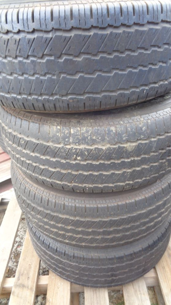 Nissan Navara D40 Thai genuine set 4 alloy rims with centre caps & tyres
