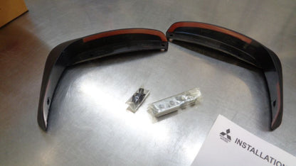 Mitsubishi Mirage Genuine Set Of Rear Mud Flap set New part
