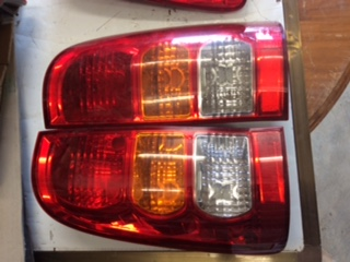 Tail lights Pair no cracks need polish suits Toyota Hilux tub Used Part