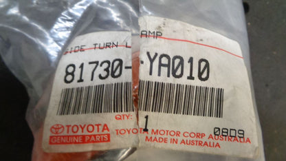 TOYOTA HILUX GENUINE GUARD INDICATOR LAMP PAIR NEW PART