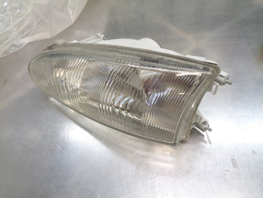 Mitsubishi CC Lancer Coupe Left Hand Front Headlight Reconditioned VGC Used Part