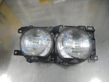 Ford Laser TX3 Genuine Right Hand Genuine Twin Head Light Assembly New Part