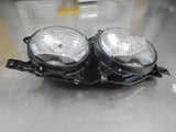 Ford Laser TX3 Genuine Right Hand Genuine Twin Head Light Assembly New Part