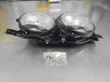 Ford Laser TX3 Genuine Right Hand Genuine Twin Head Light Assembly New Part