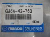 Mazda 3/5/CX-3/CX-7 Genuine Fuel Tank Pad New Part