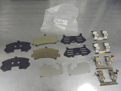 Nissan Tiida Genuine Hardware Kit Front Disc Brake Pad New Part