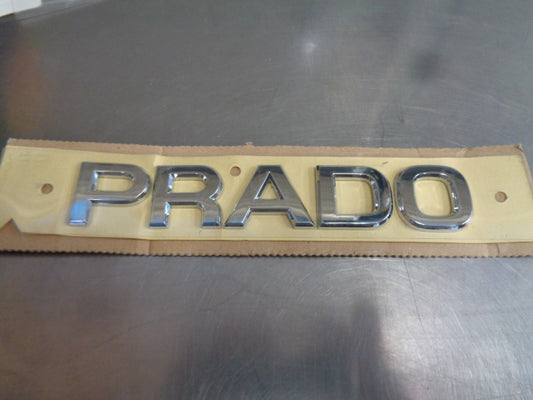 Toyota 120 Series Prado Genuine Rear PRADO Emblem New Part