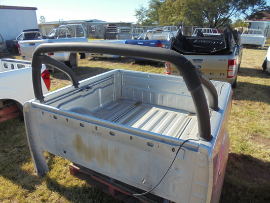 Nissan Navara ST dual cab tub silver in colour with alloy roll bar