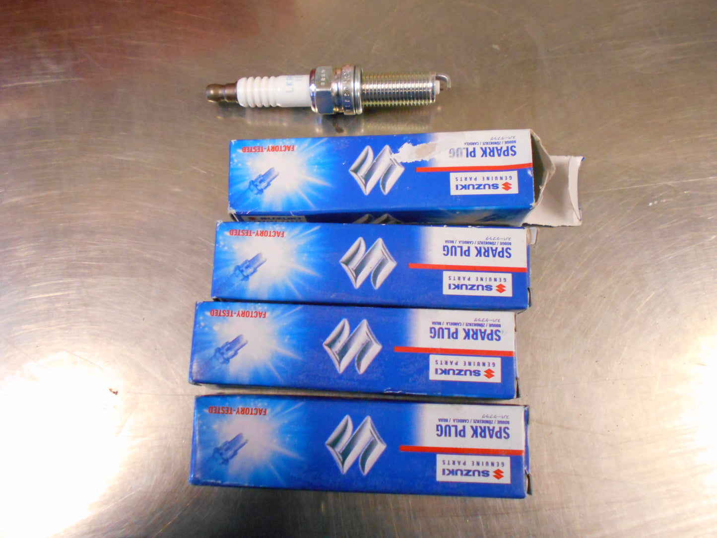 Suzuki Swift Genuine Spark Plugs New Part