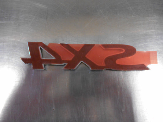 Suzuki SX4 Genuine Emblem Nameplate New Part