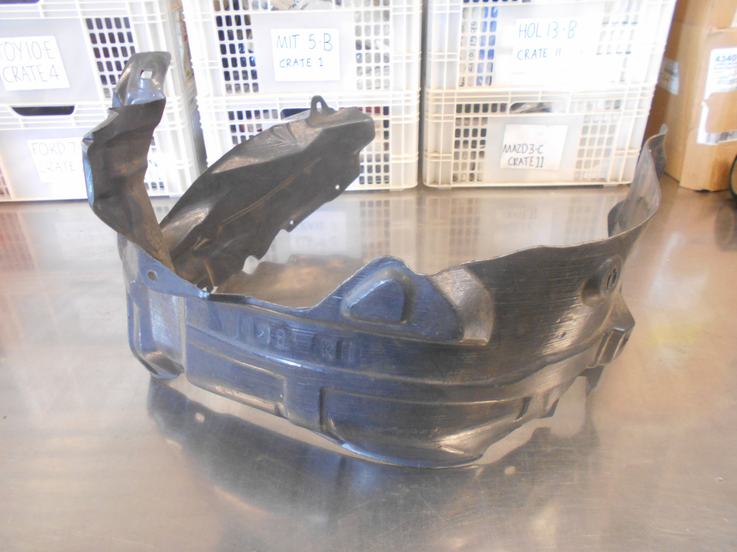 FORD LASER Right Hand Front Guard Liner New Part