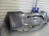 Mitsubishi Mirage Genuine Rear Bumper Cover New Part