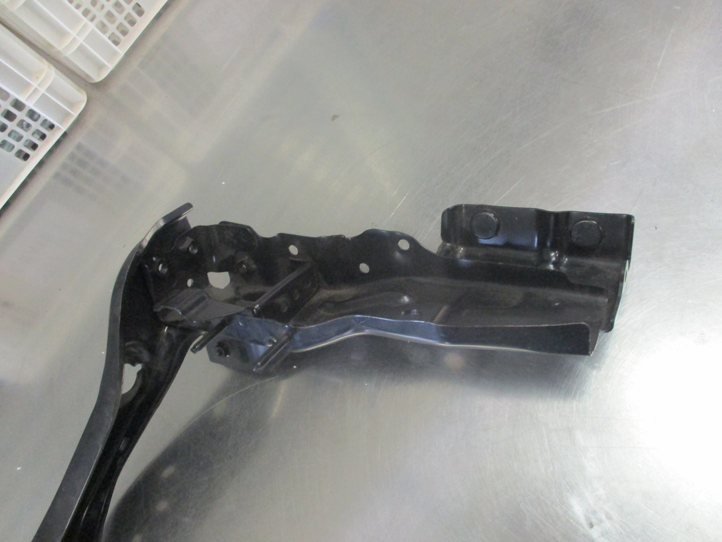 Mitsubishi 380 Genuine Left Hand Front Headlight Support Bracket New Part